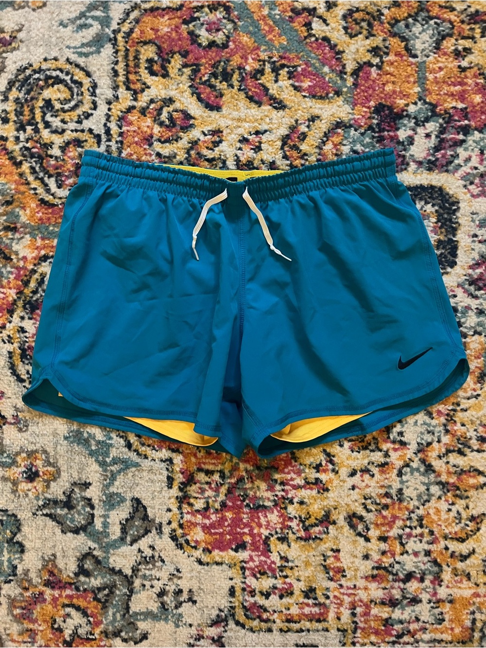 Nike Women's blue Athletic Shorts with Yellow Liner